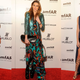 Illustration for article titled Fashion Week Begins, and Lindsay Lohan Is a Stain on the Red Carpet